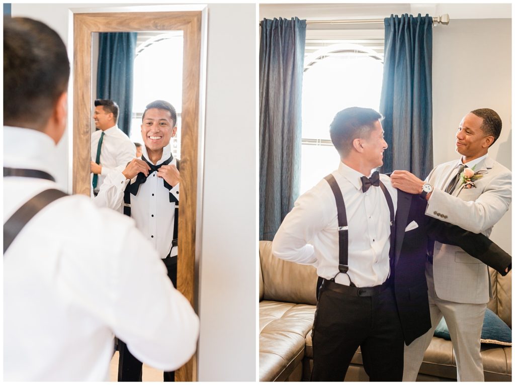 The groom adjusts his bowtie and puts on his jacket in the groom suite at Avensole Winery wedding venue in Temecula.