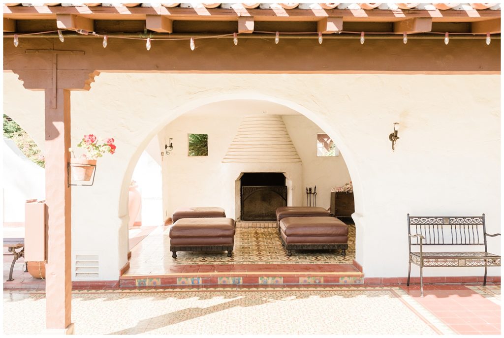 Cozy outdoor fireplace in the courtyard of Casa Romantica in Orange County, CA.