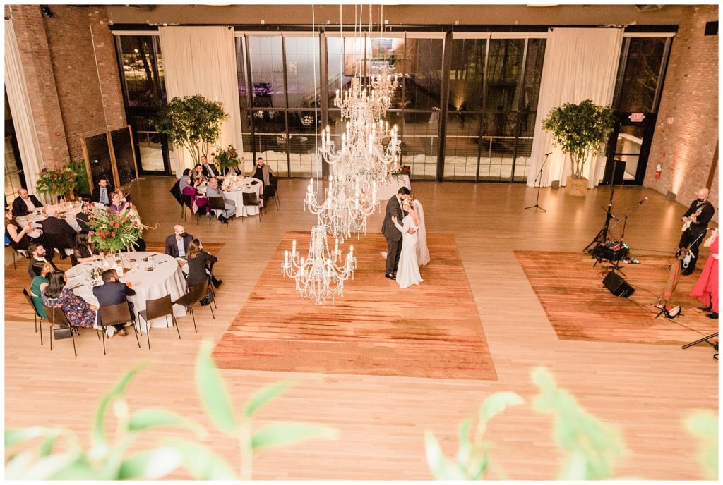 Overhead view of bride and groom share a first dance at their winter wedding in Beacon NY at Roundhouse Hotel winter wedding inspiration.in Beacon NY at Roundhouse Hotel.
