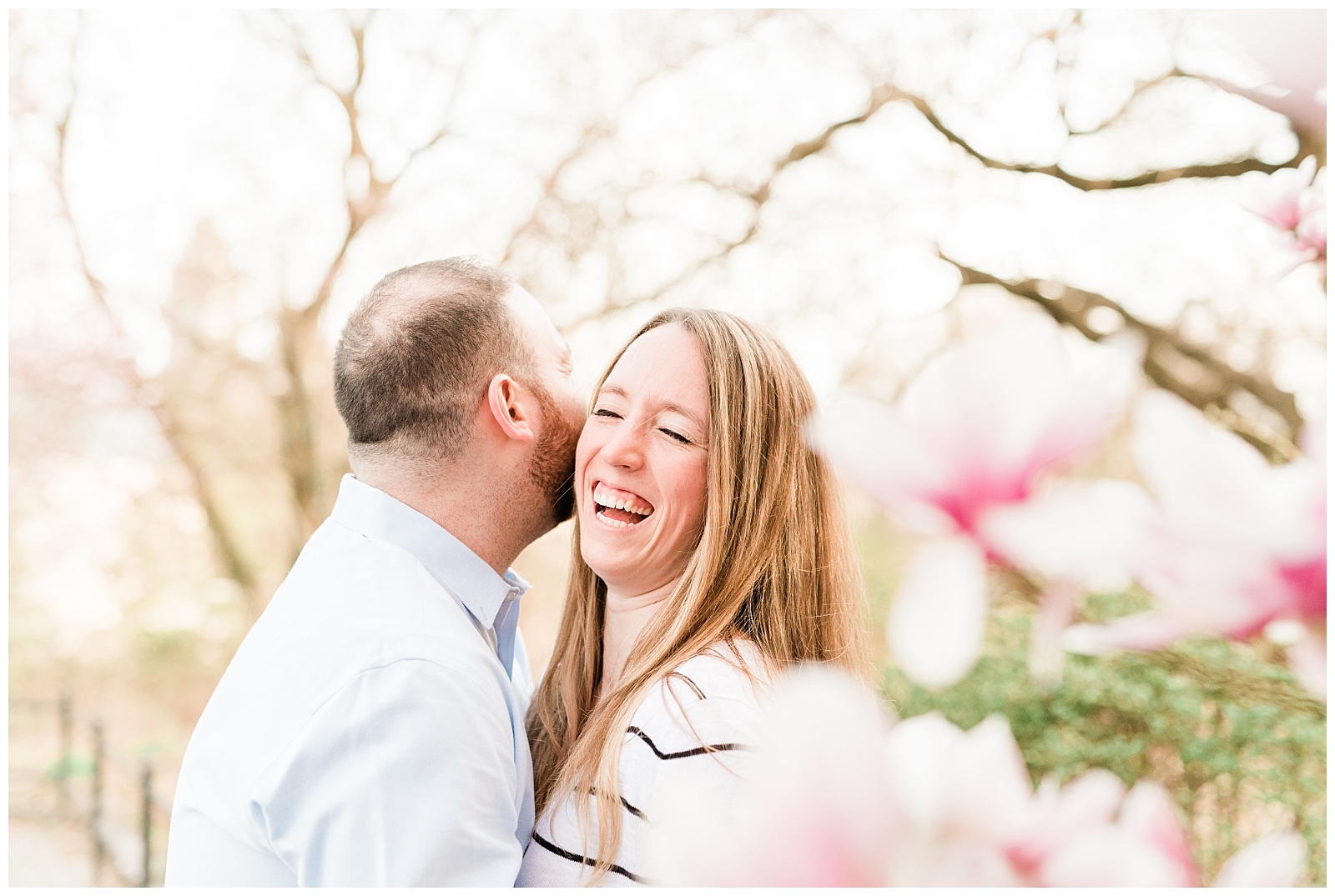 Central Park, NYC engagement session, springtime, wedding photographer, New York, laughing, flowers, blooming