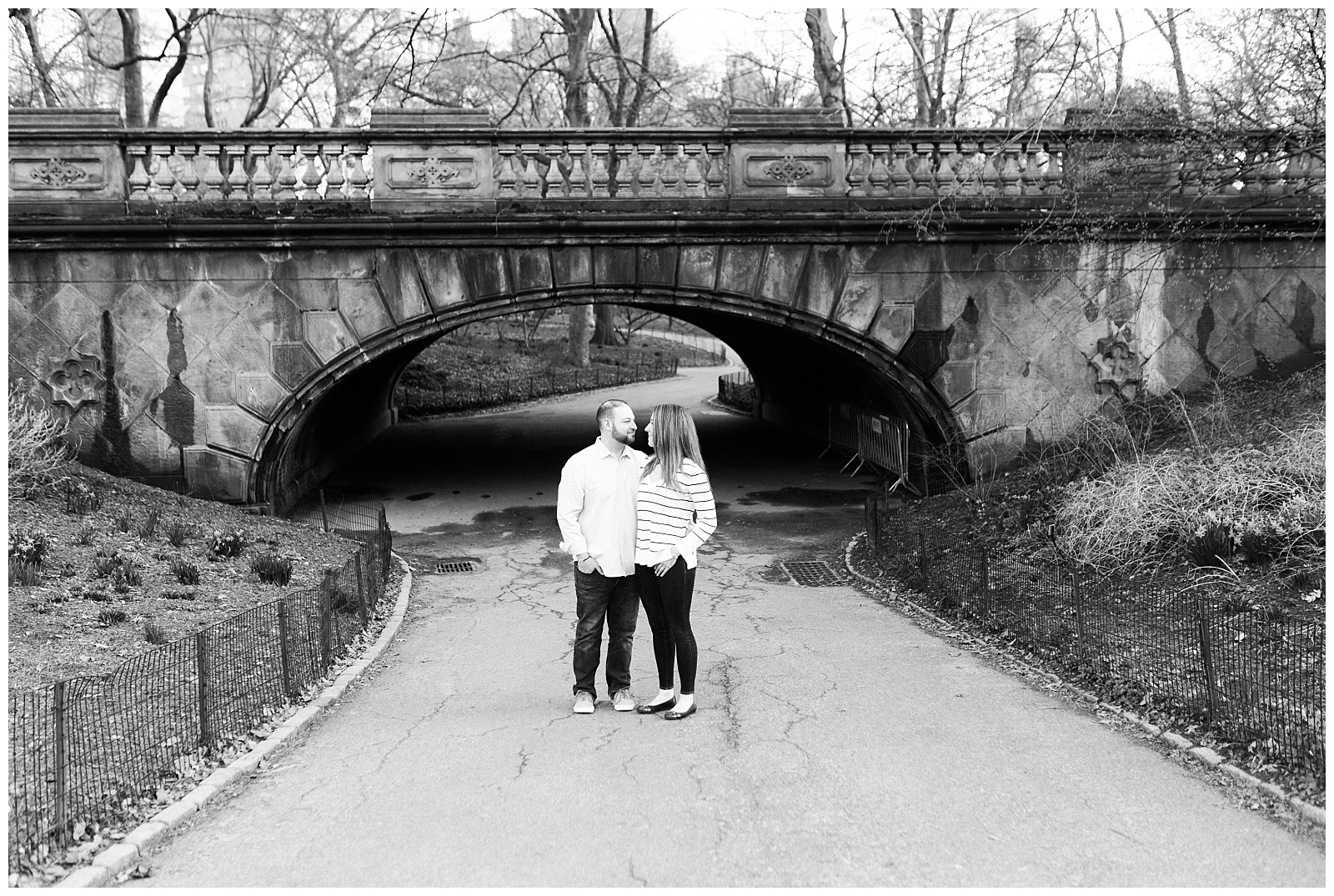 Central Park, NYC engagement session, springtime, wedding photographer, New York, black and white, bridge, architecture