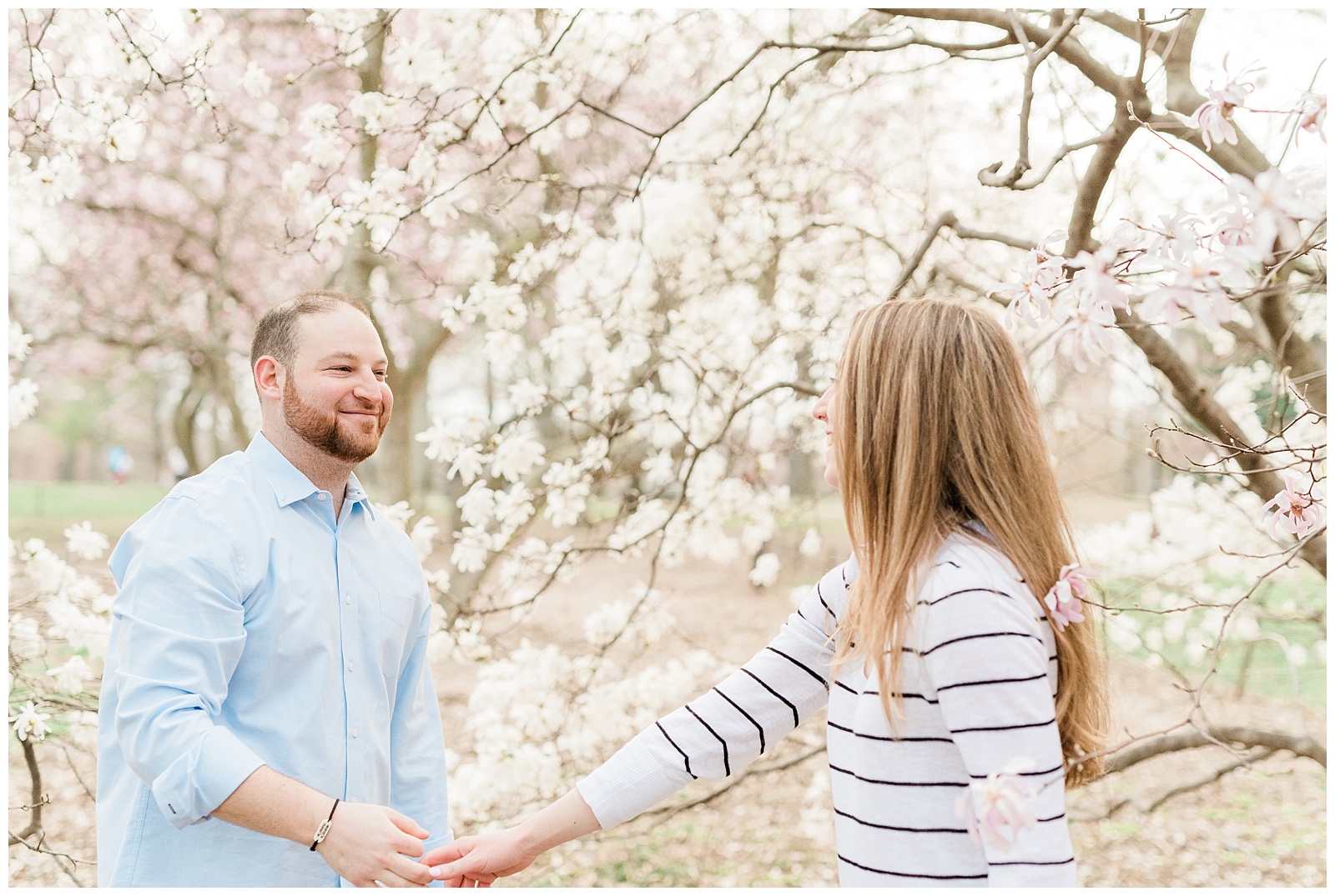 Central Park, NYC engagement session, springtime, wedding photographer, New York, dancing, cherry blossoms