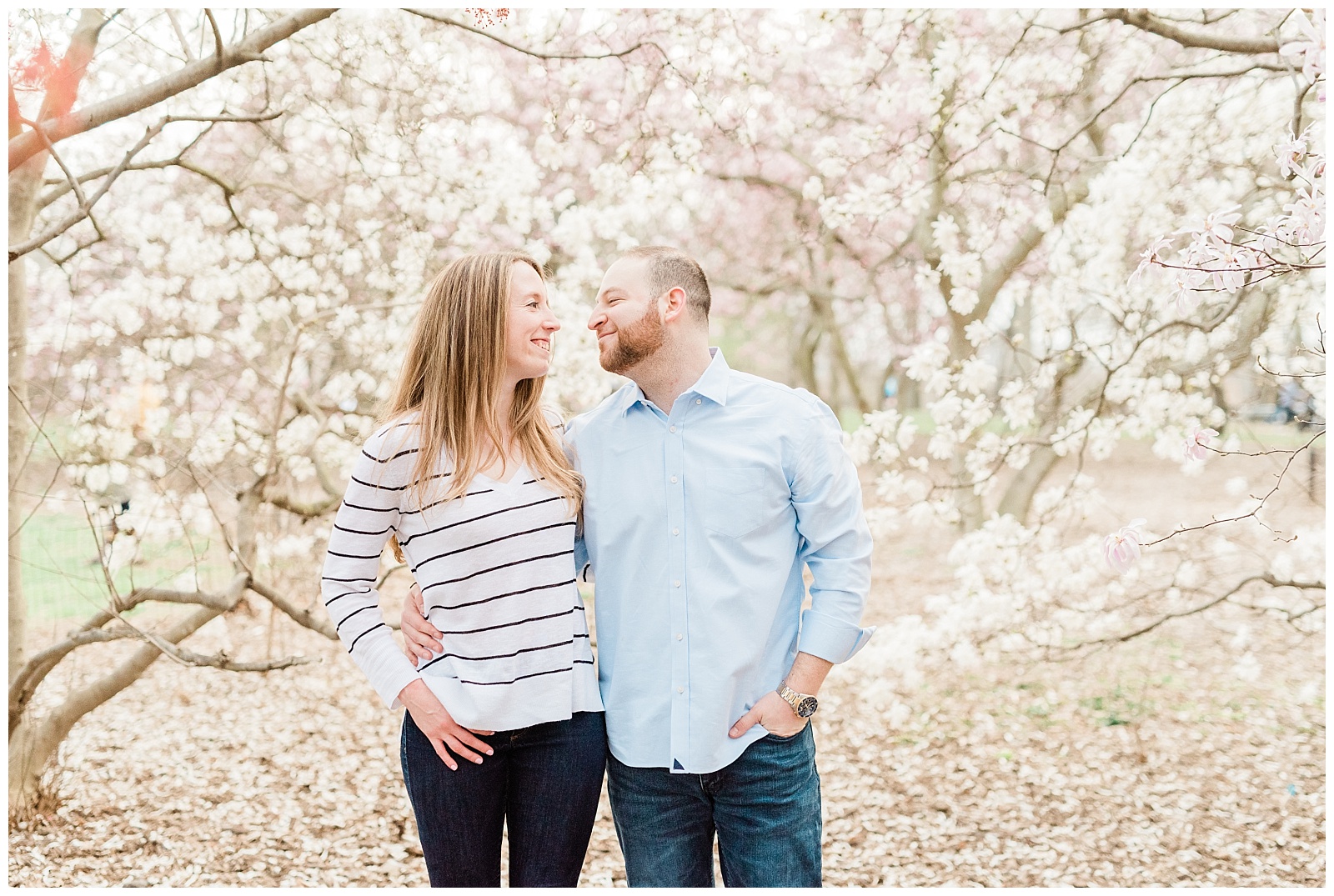 Central Park, NYC engagement session, springtime, wedding photographer, New York, cherry blossom, flowers, bloom, petals