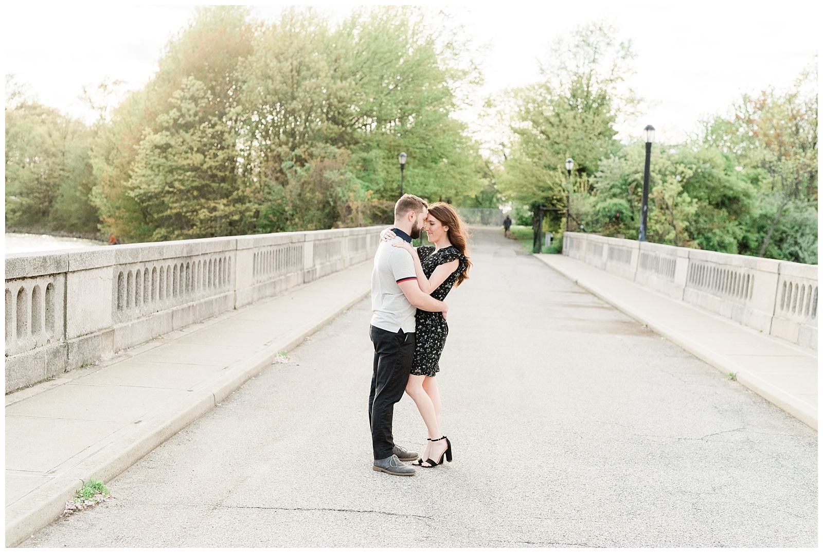 A couple holds onto each other on a bridge in Silver Lake Park, Staten Island.