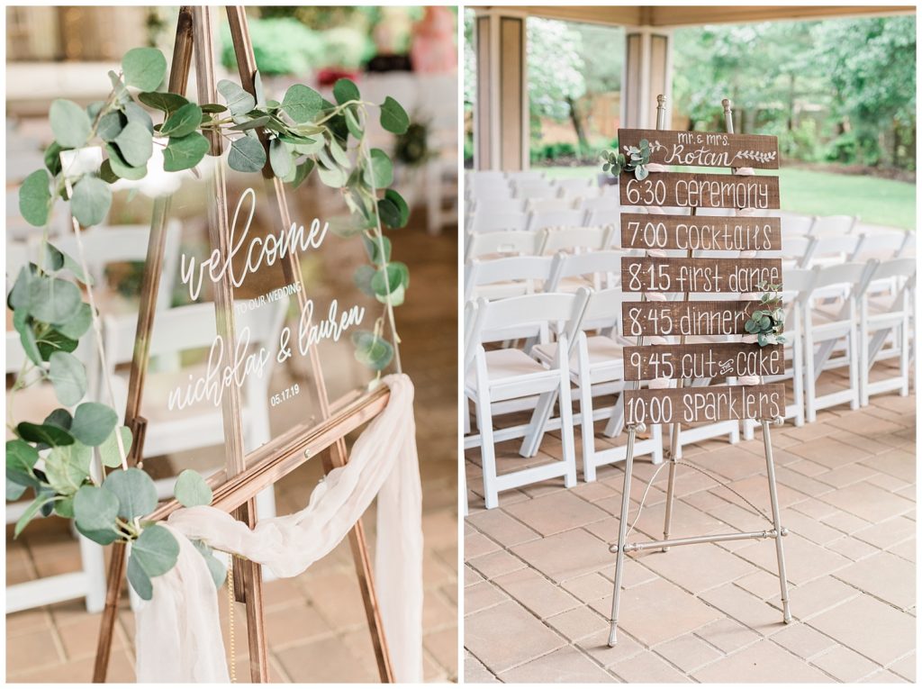 A welcome sign is draped in greenery and fabric in the ceremony space at Scotland Run.