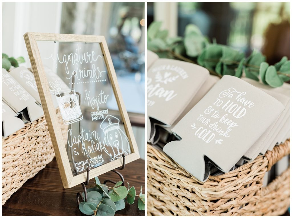 A hand drawn signature drink sign sits next to a basket of koozie favors.