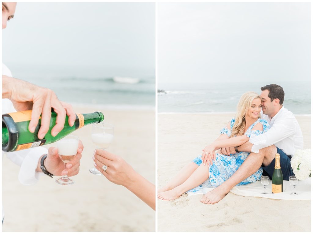 A couple pours a glass of champagne on the beach in NJ.