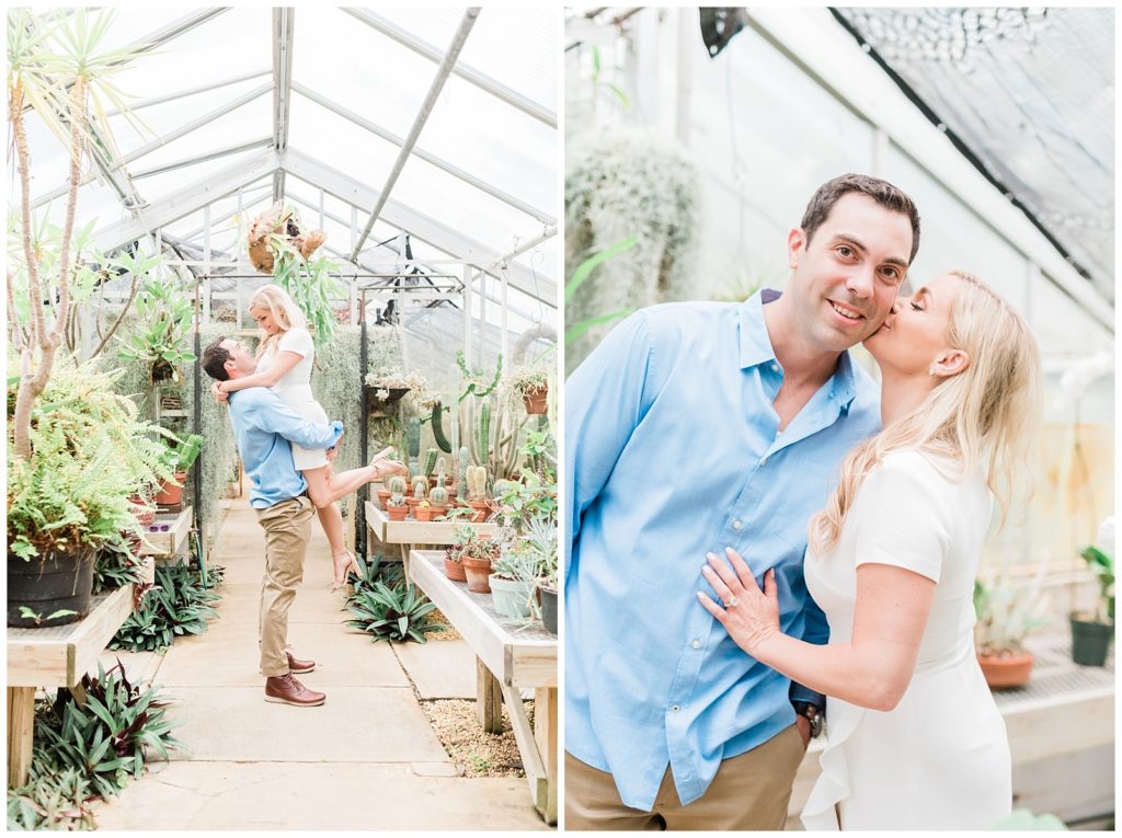 A man lifts up his fiance in a light filled greenhouse.