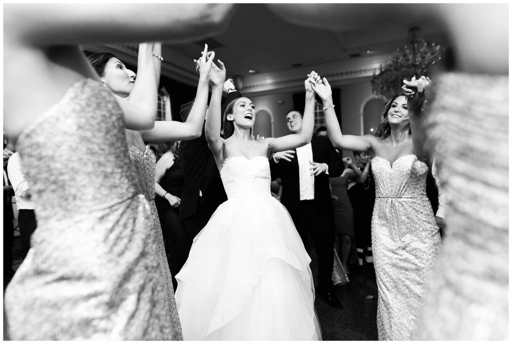 Bride dances on the dance floor during the reception.