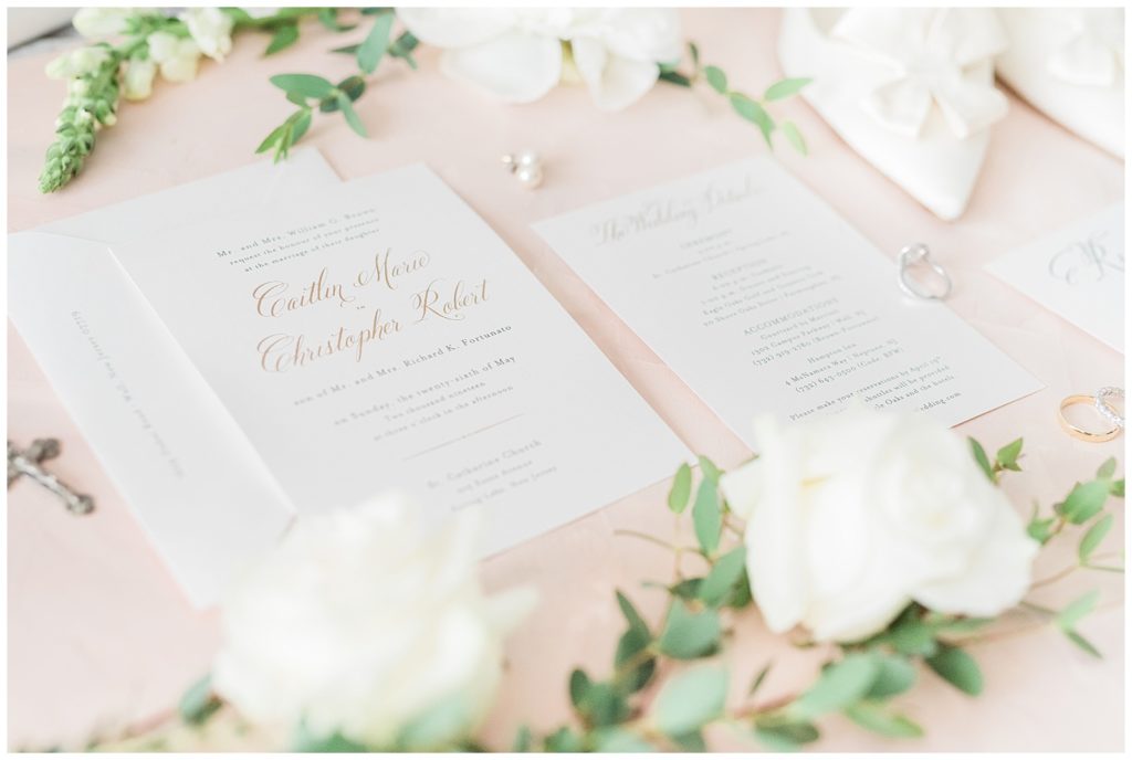 Wedding invitation suite styled with florals.