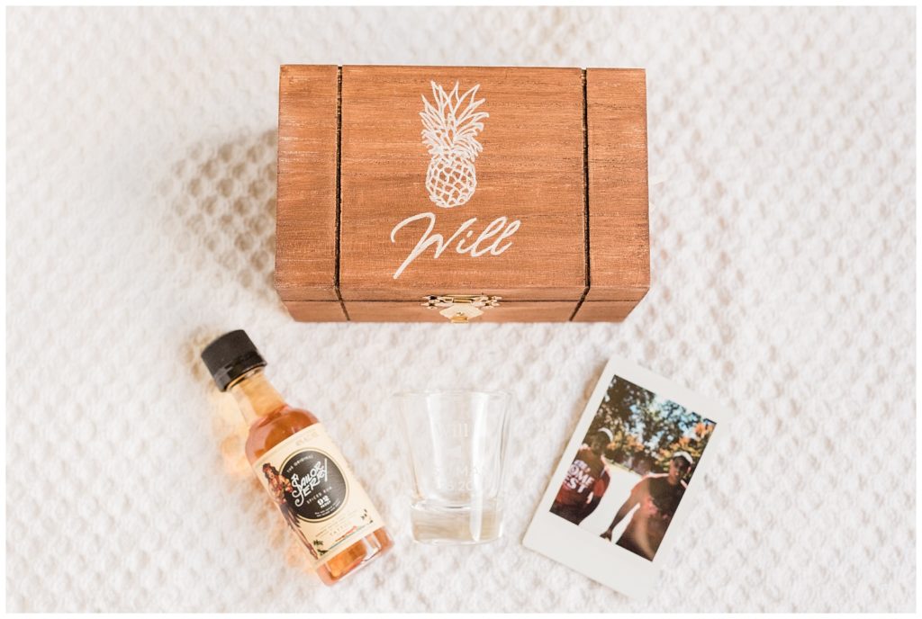 Best man proposal gift with wooden pineapple box, shot glass and polaroid.