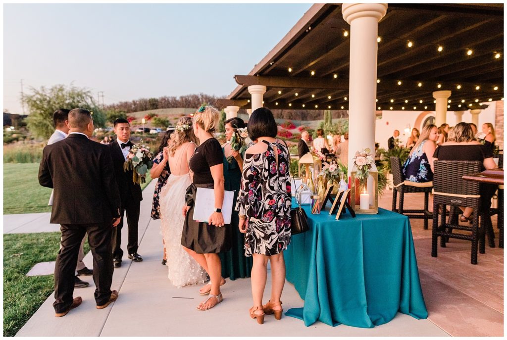 Guests enjoy evening cocktail hour at Avensole Winery, Temecula wedding venue in Southern California.