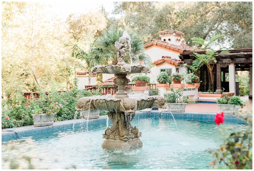 A detailed fountain sprays water in the courtyard at Rancho Las Lomas in Orange County, California.